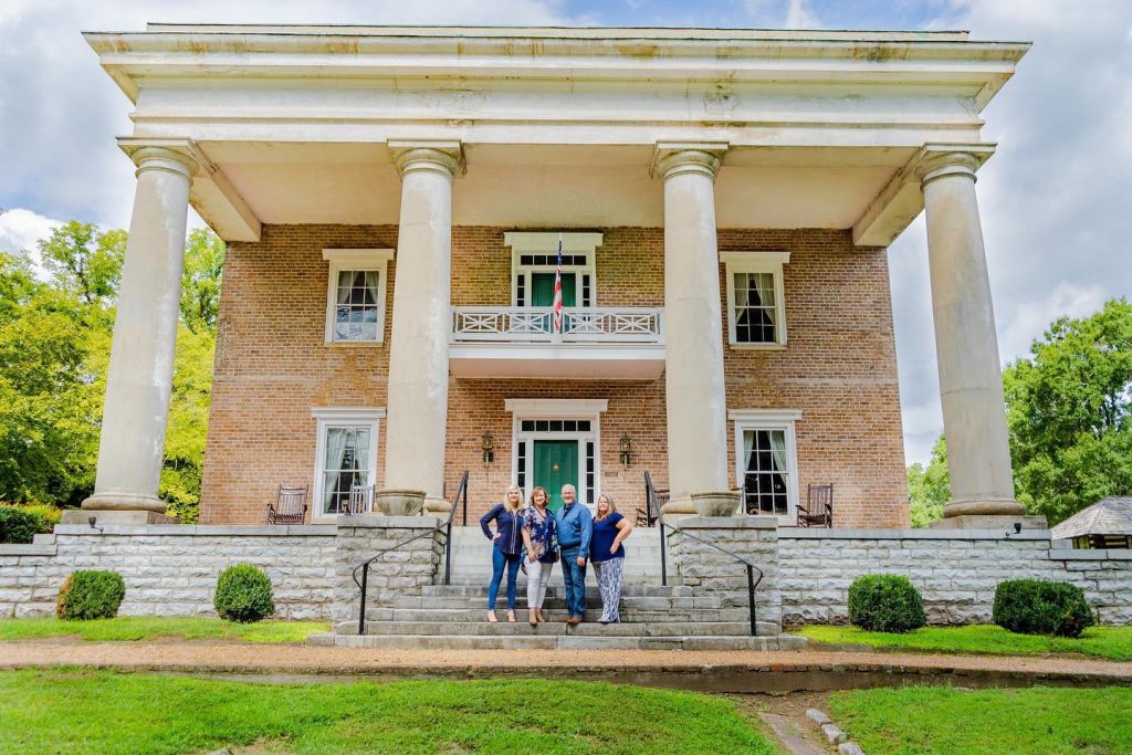 The HCDD team in front of the Gordon Lee Mansion