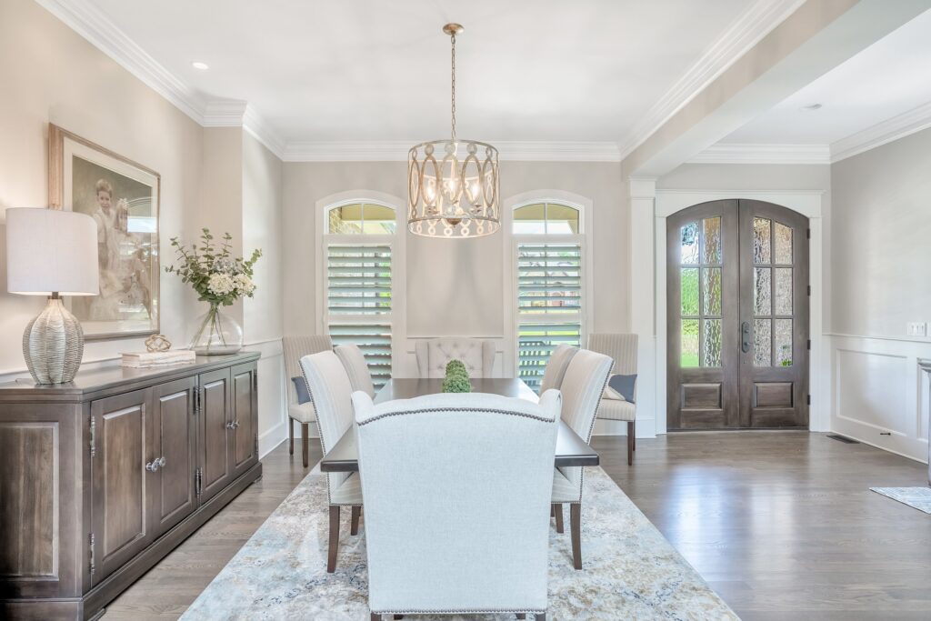 Dining room with big wooden door