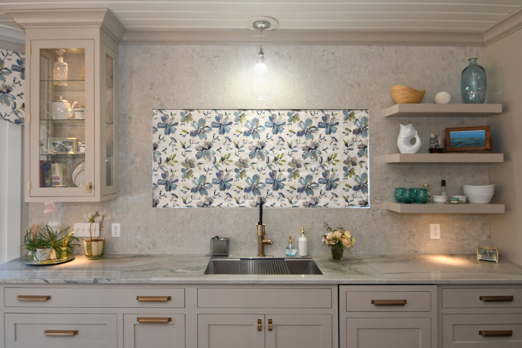 Motorized window shade above the sink