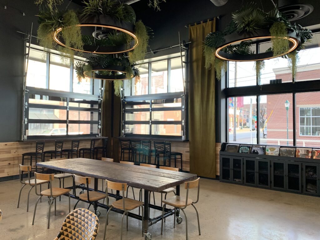 Market South Dining area with long commercial drapery panels